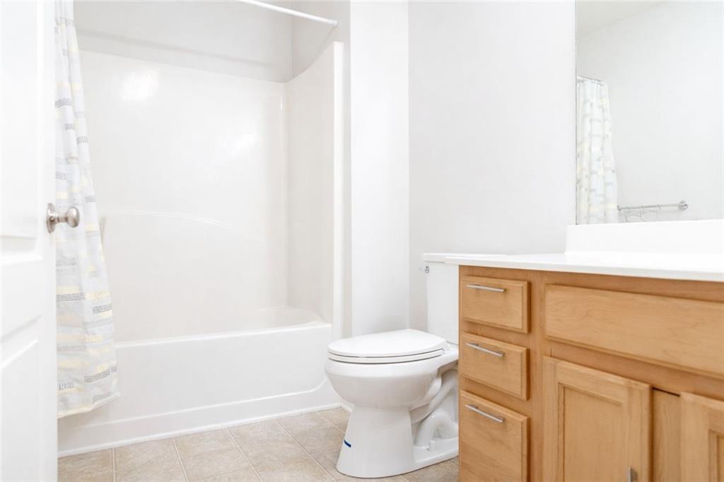 544 Ridge View Crossing Woodstock, GA 30188 - Photo 22 of 30 a bathroom with a sink and a toilet