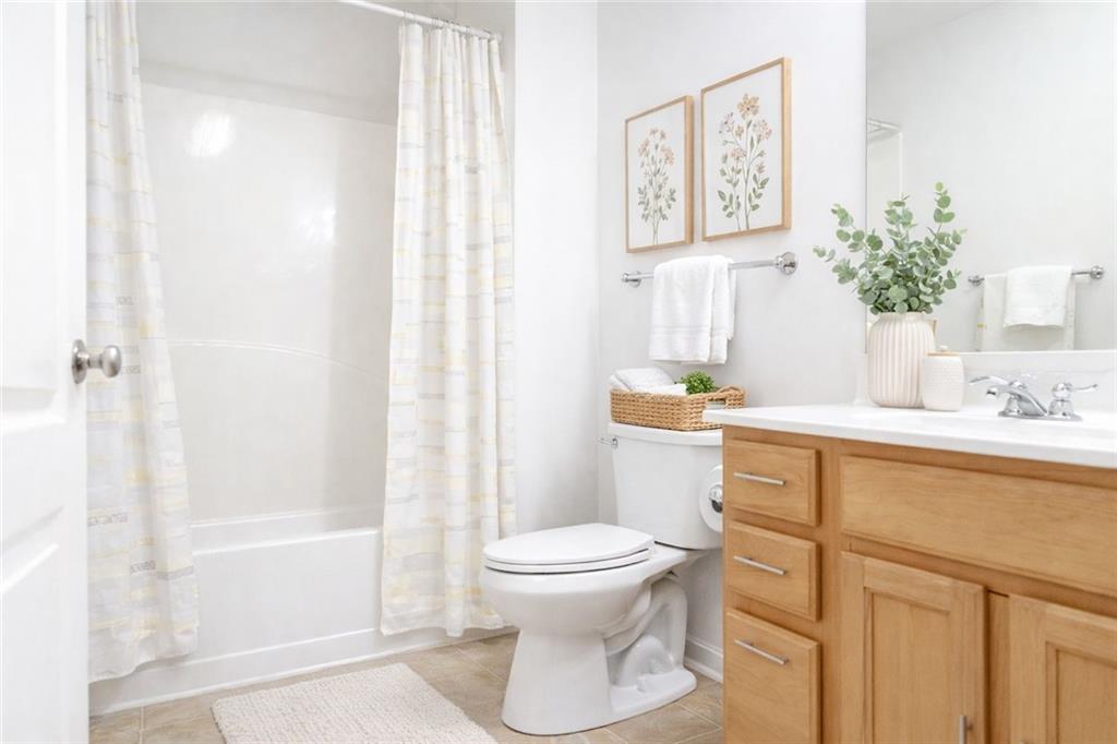 544 Ridge View Crossing Woodstock, GA 30188 - Photo 23 of 30 a bathroom with a sink toilet and shower