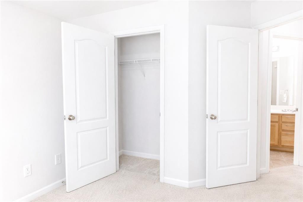 544 Ridge View Crossing Woodstock, GA 30188 - Photo 26 of 30 a view of a closet area with empty room