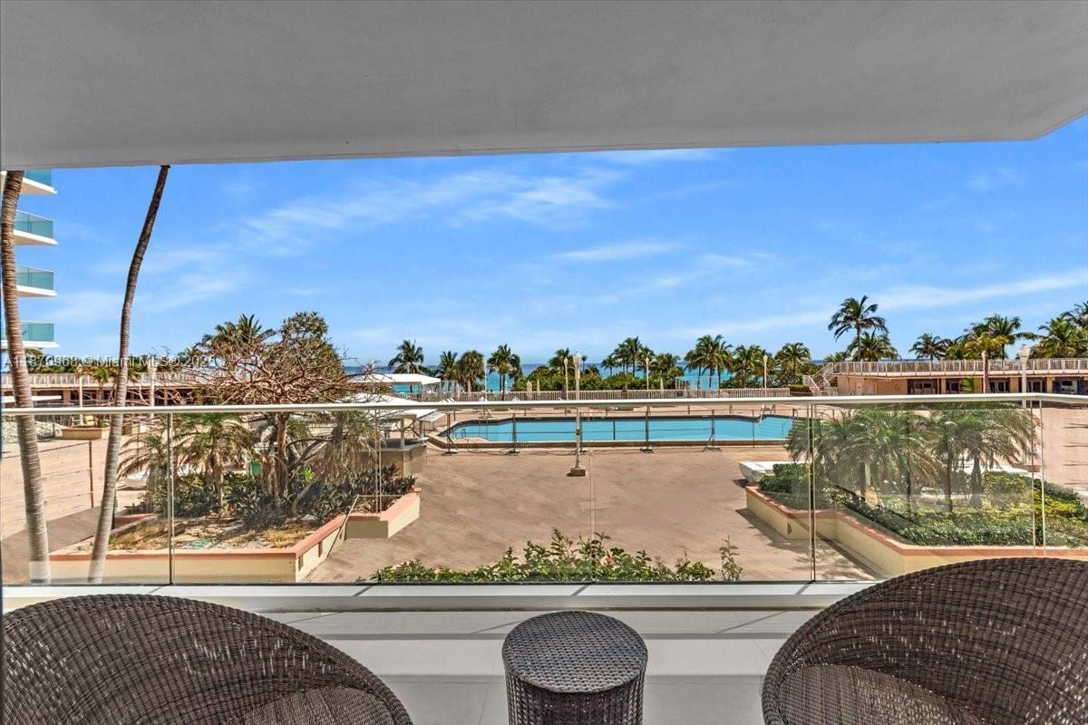 9801 Collins Avenue, Unit 4Y Bal Harbour, FL 33154 - Photo 27 of 71 a view of a balcony with city view