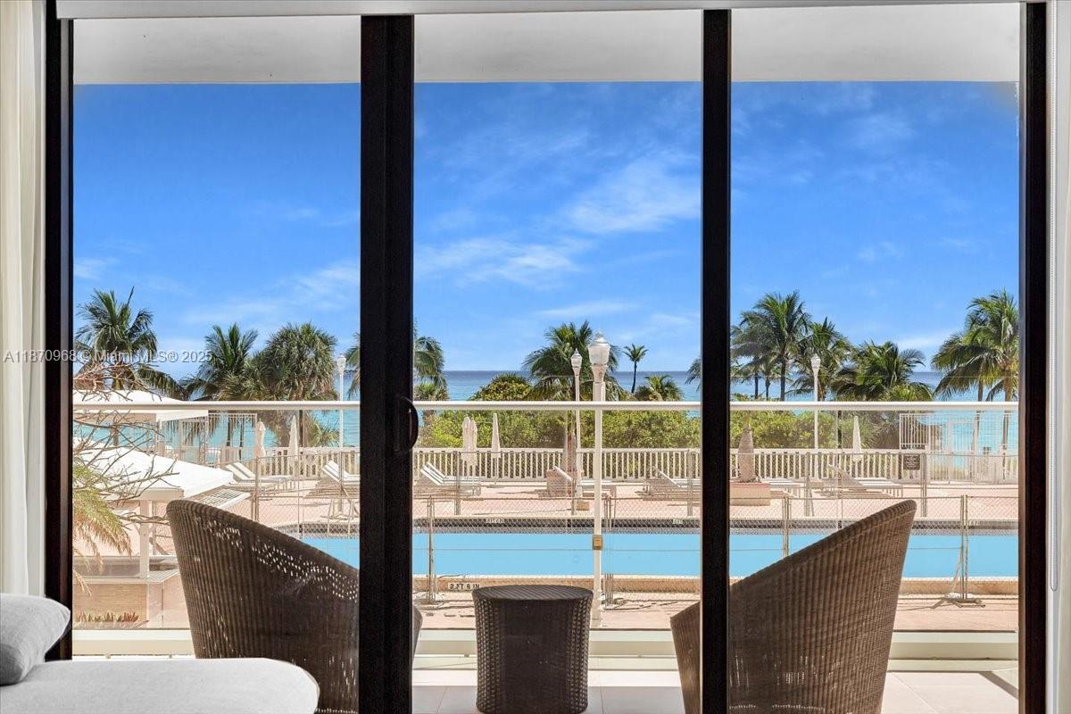 9801 Collins Avenue, Unit 4Y Bal Harbour, FL 33154 - Photo 3 of 71 a view of a balcony with lake view