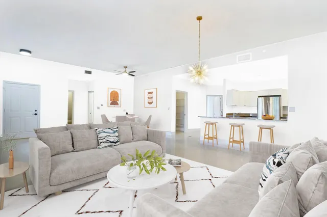 an aerial view of a house with a lake view