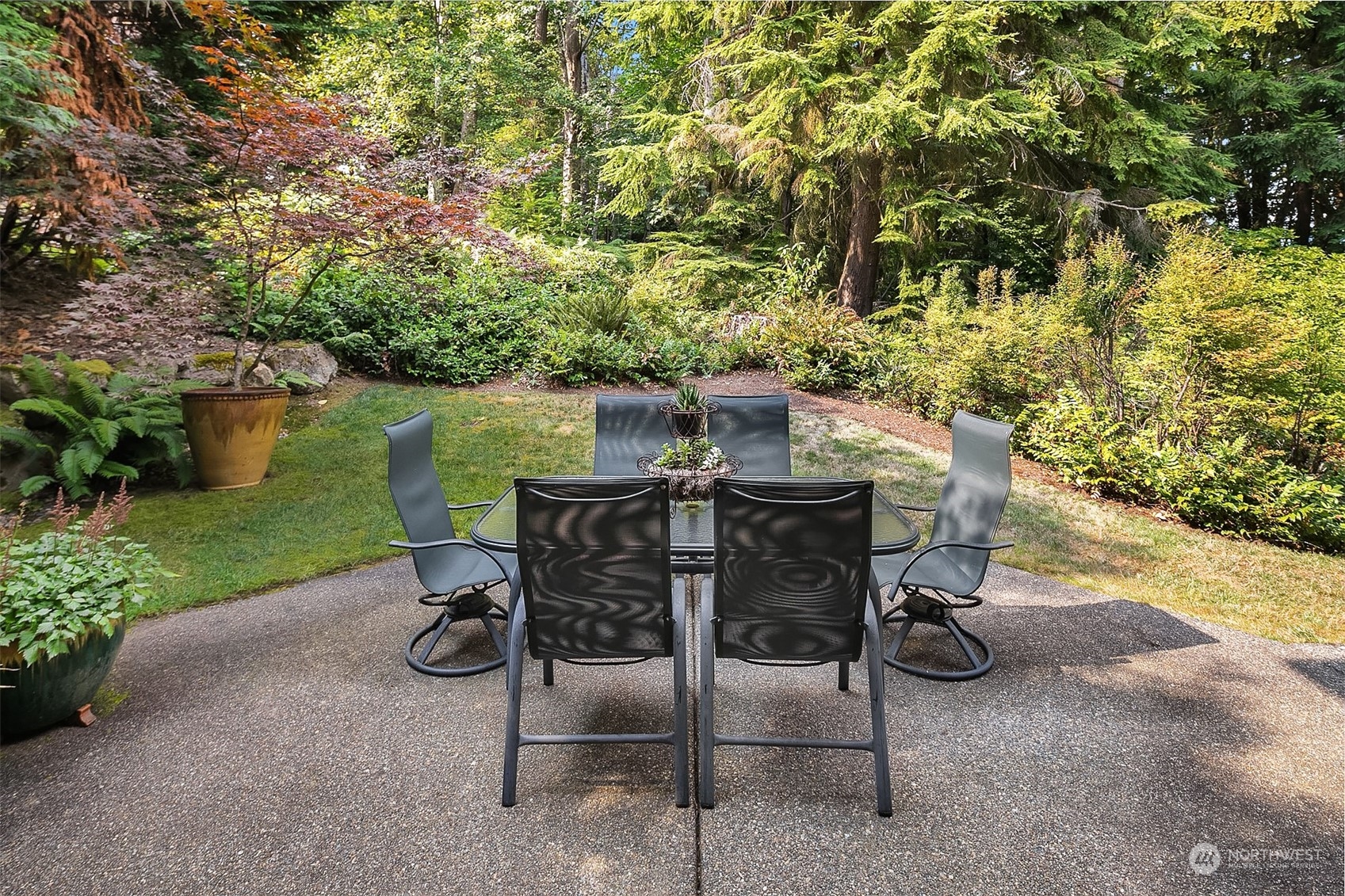 16030 Southeast 48th Drive Bellevue, WA 98006 - Photo 15 of 35 a view of a chairs and table in the patio