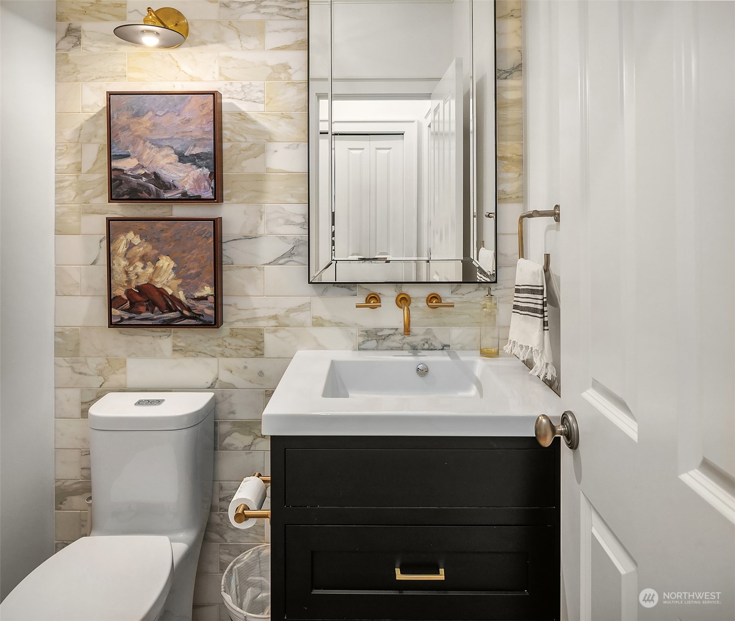 16030 Southeast 48th Drive Bellevue, WA 98006 - Photo 19 of 35 a bathroom with a sink toilet and mirror