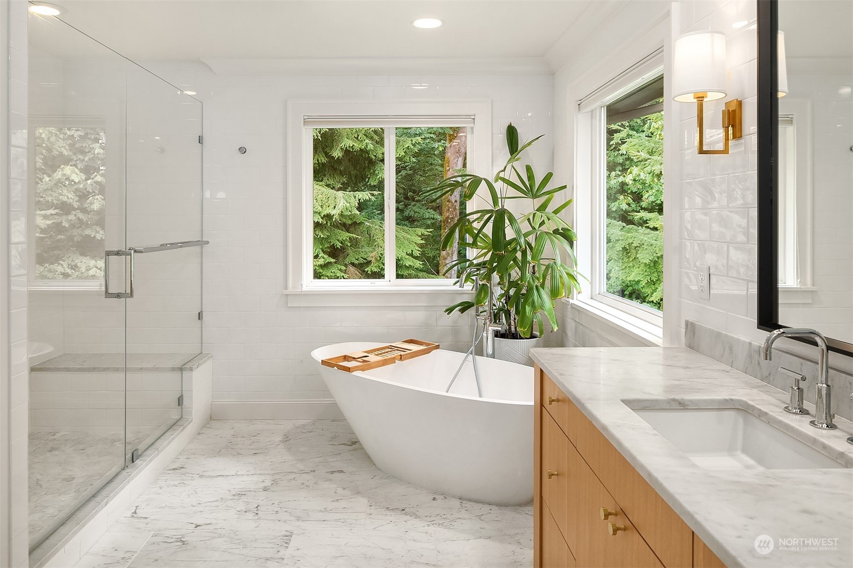 16030 Southeast 48th Drive Bellevue, WA 98006 - Photo 26 of 35 a bath tub sitting in a bathroom next to a window