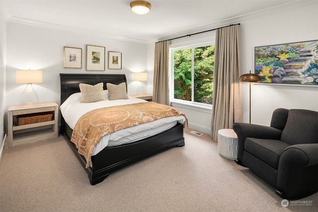 a bed room with a bed and a couch