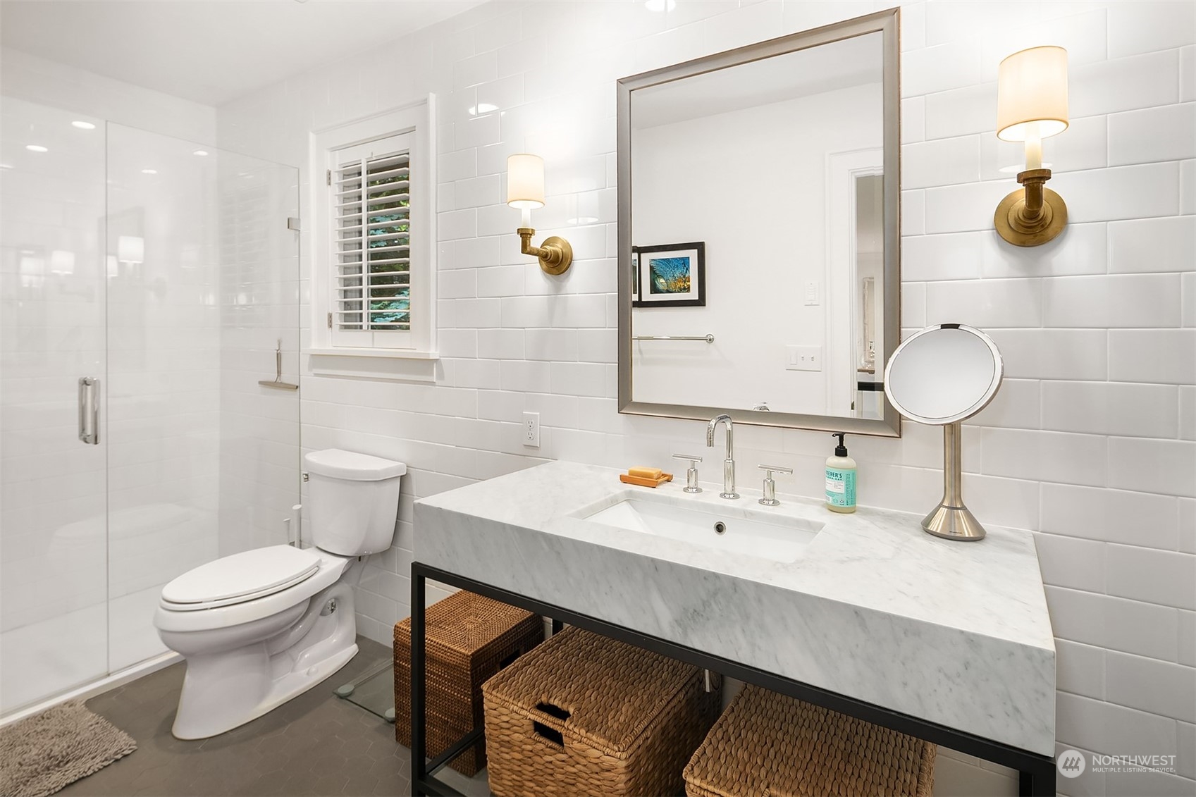 16030 Southeast 48th Drive Bellevue, WA 98006 - Photo 30 of 35 a bathroom with a sink mirror and toilet