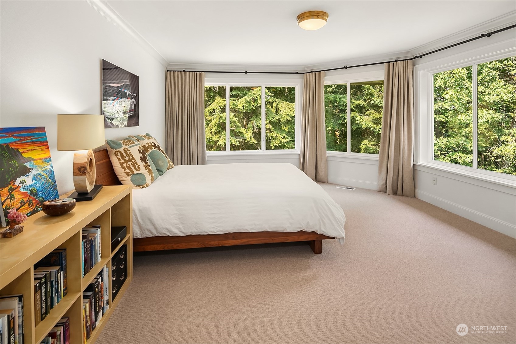 16030 Southeast 48th Drive Bellevue, WA 98006 - Photo 31 of 35 a bed sitting in a bedroom next to a window