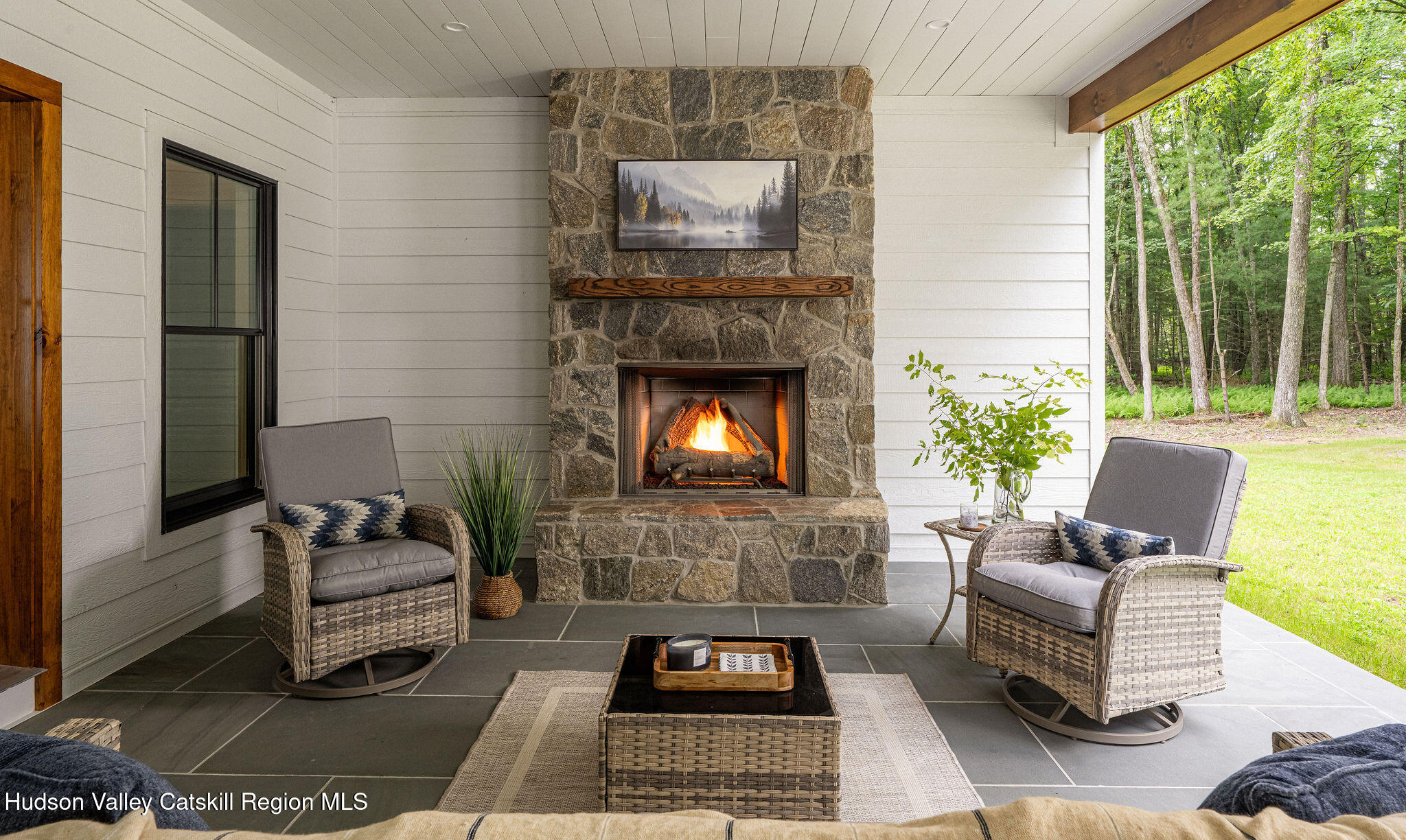 393 Buck Road Stone Ridge, NY 12484 - Photo 27 of 41 back porch fireplace