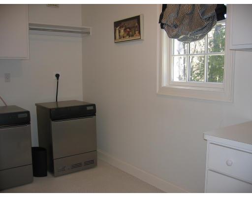 1080 North Street Walpole, MA 02081 - Photo 16 of 20 a room with a window and a hallway