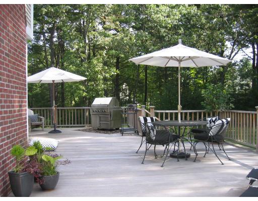 1080 North Street Walpole, MA 02081 - Photo 17 of 20 a view of balcony with wooden floor outdoor seating