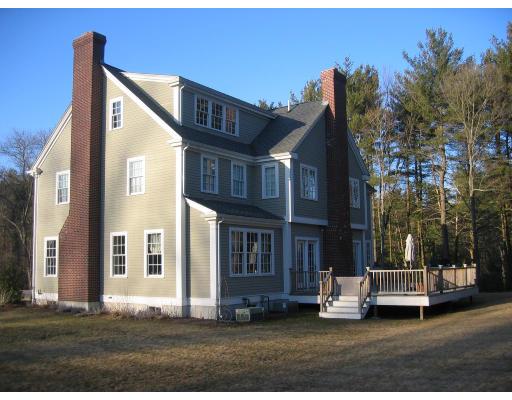1080 North Street Walpole, MA 02081 - Photo 18 of 20 a view of a house with a yard