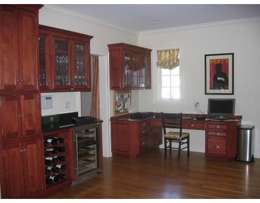 1080 North Street Walpole, MA 02081 - Photo 3 of 20 a kitchen with stainless steel appliances granite countertop a stove and a refrigerator