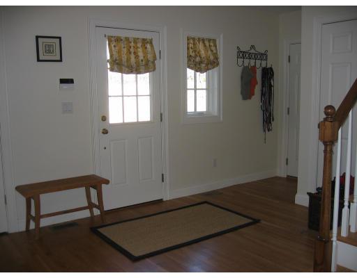 1080 North Street Walpole, MA 02081 - Photo 4 of 20 a view of a bedroom with two beds and a window