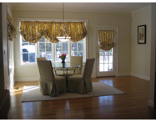 1080 North Street Walpole, MA 02081 - Photo 5 of 20 a dining room with furniture a chandelier and wooden floor