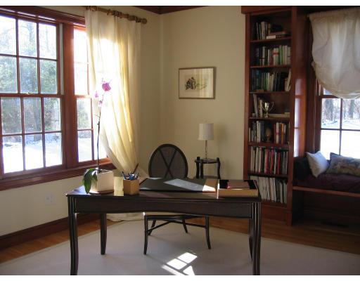 1080 North Street Walpole, MA 02081 - Photo 7 of 20 a view of a workspace with a window and couch