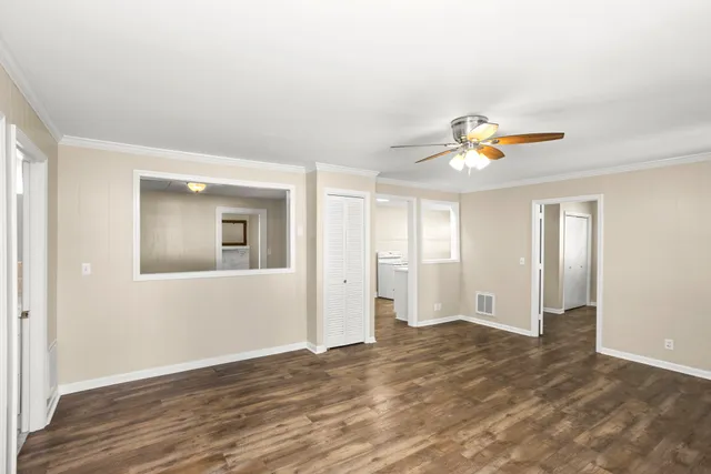 a view of an empty room and window