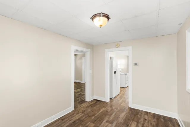 a view of a livingroom with wooden floor