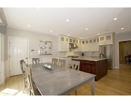 113 Flint Farm Road Middleton, MA 01949 - Photo 3 of 29 a living room with stainless steel appliances kitchen island granite countertop furniture and wooden floor