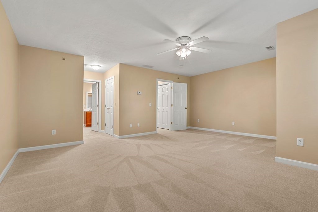 21 Conover Way, Unit 21 Haverhill, MA 01835 - Photo 12 of 31 a view of an empty room with a fan