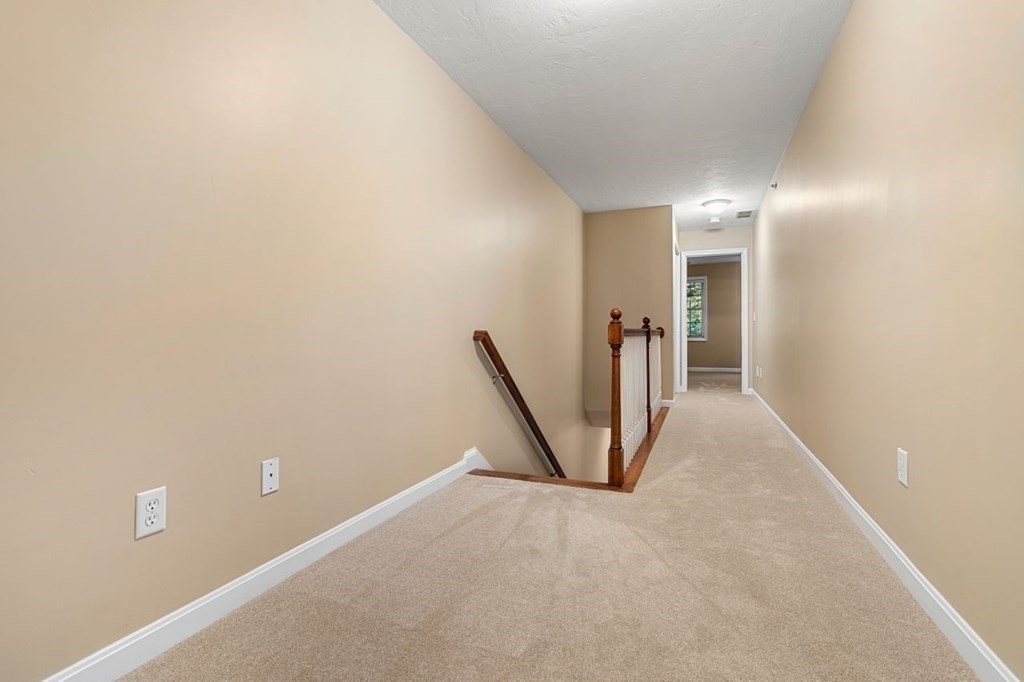21 Conover Way, Unit 21 Haverhill, MA 01835 - Photo 18 of 31 a view of a hallway with staircase