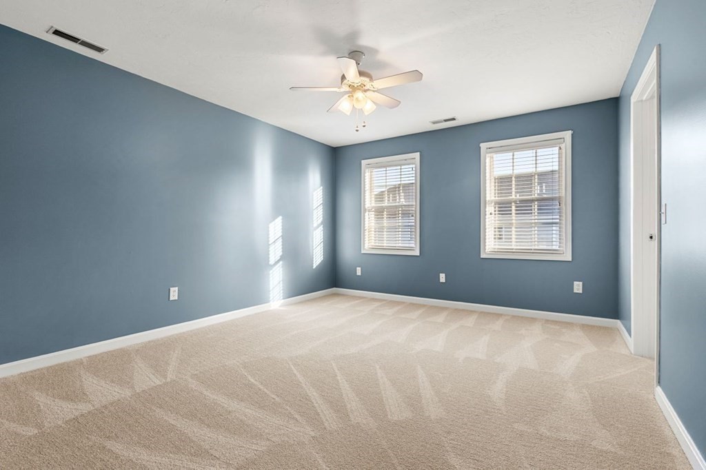 21 Conover Way, Unit 21 Haverhill, MA 01835 - Photo 20 of 31 a view of an empty room with a window