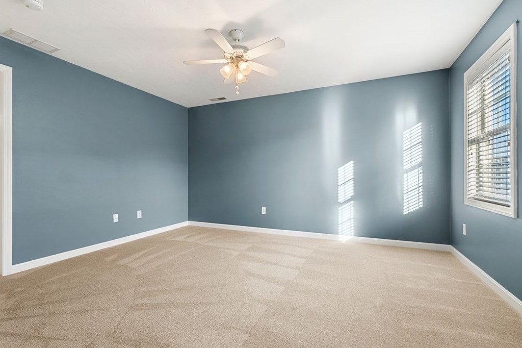 21 Conover Way, Unit 21 Haverhill, MA 01835 - Photo 21 of 31 a view of an empty room with a window