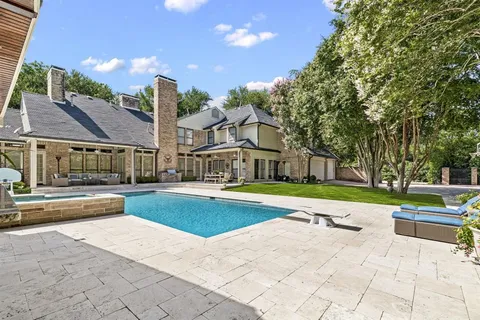 a view of a building with a swimming pool