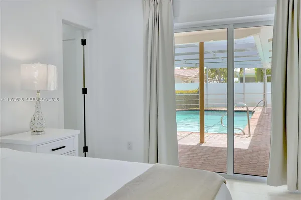 a bathroom with sink and mirror