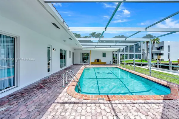 a room with lots of table and chairs