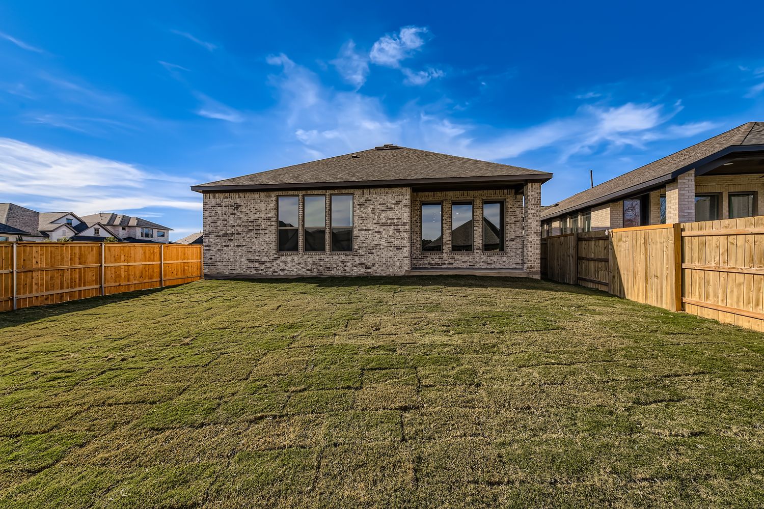 395 Prickly Poppy Loop Kyle, TX 78640 - Photo 11 of 11 a view of a house with a backyard