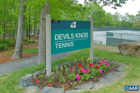 a sign broad on the side of a road