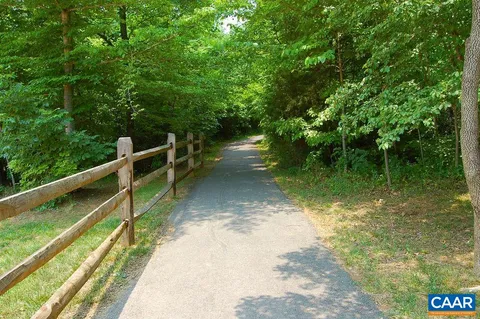 a view of a house with backyard porch and sitting area