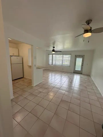 a view of a livingroom & window
