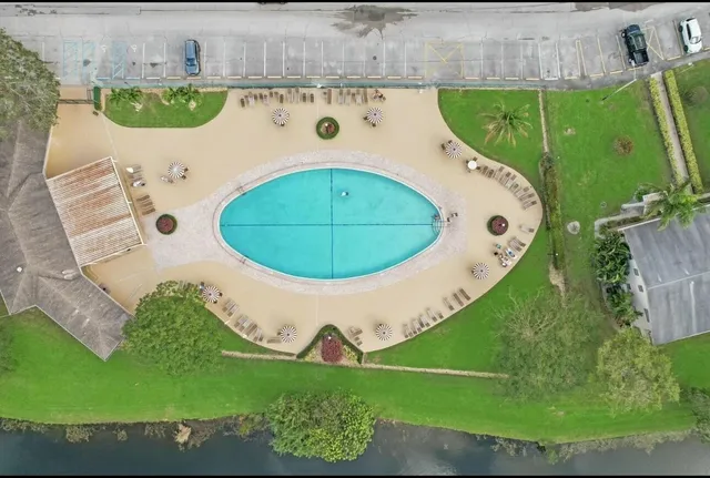 an aerial view of a swimming pool