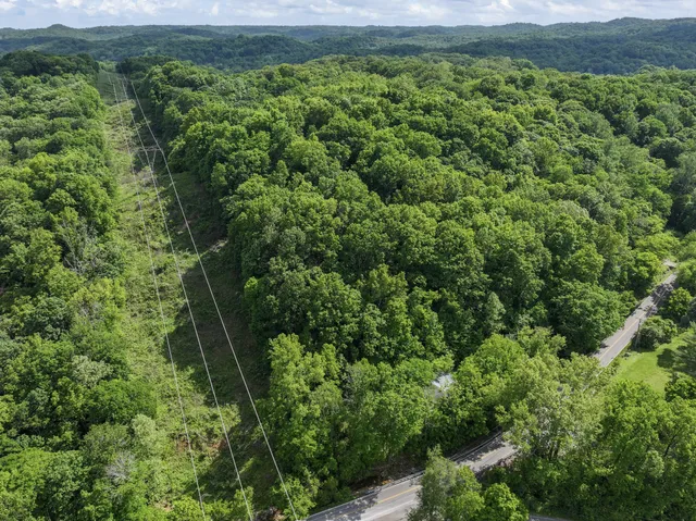 a view of a yard with an outdoor space