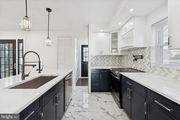 a view of a utility room with a sink
