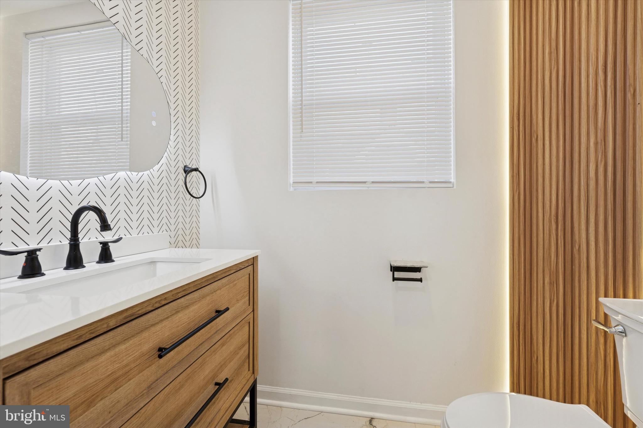 323 Derwyn Road Lansdowne, PA 19050 - Photo 19 of 50 main level: half bathroom