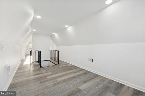 a hallway with cabinets