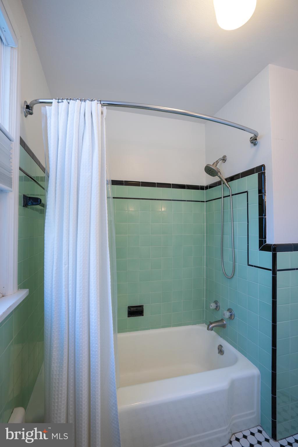 422 Martin Terrace State College, PA 16803 - Photo 19 of 56 a bathroom with a shower and a bathtub