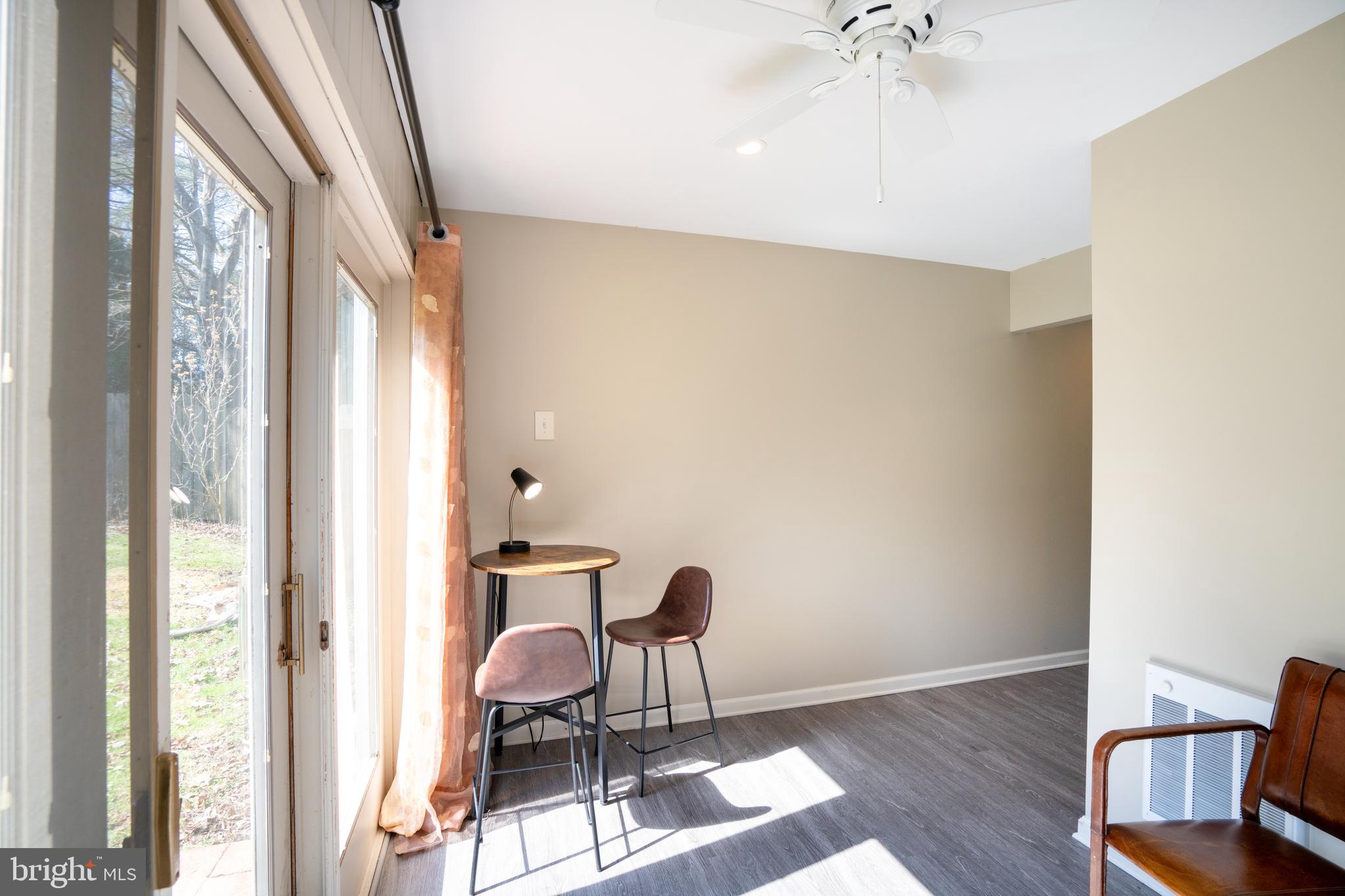 422 Martin Terrace State College, PA 16803 - Photo 25 of 56 a view of a room with wooden floor and windows