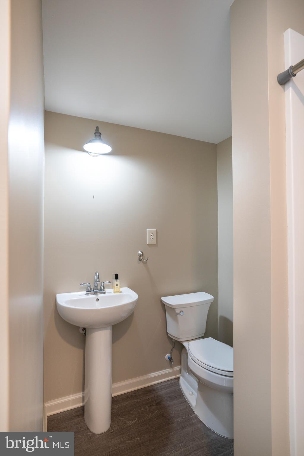 422 Martin Terrace State College, PA 16803 - Photo 27 of 56 a bathroom with a sink toilet and a mirror