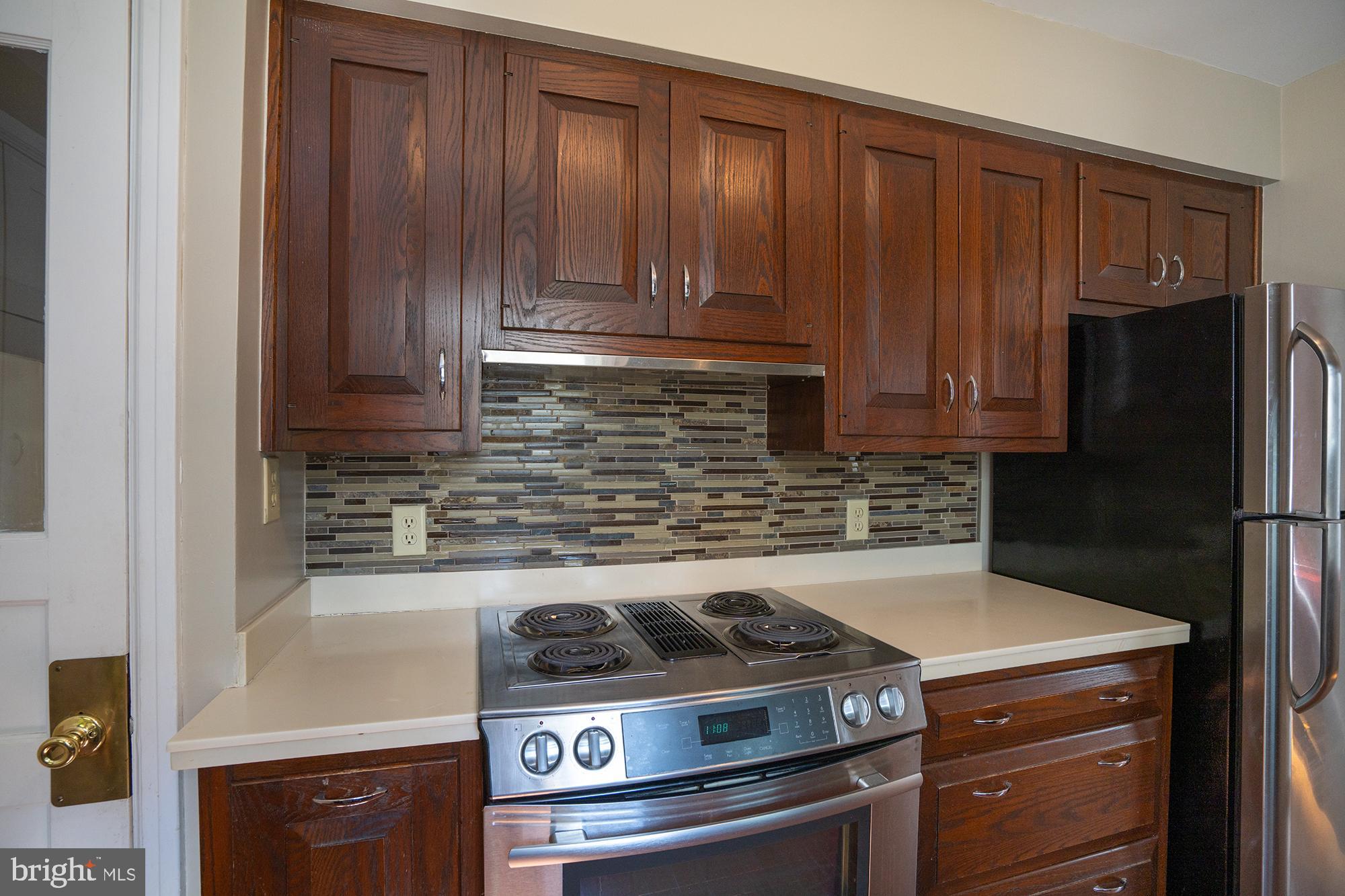 422 Martin Terrace State College, PA 16803 - Photo 10 of 56 a stove top oven sitting inside of a kitchen