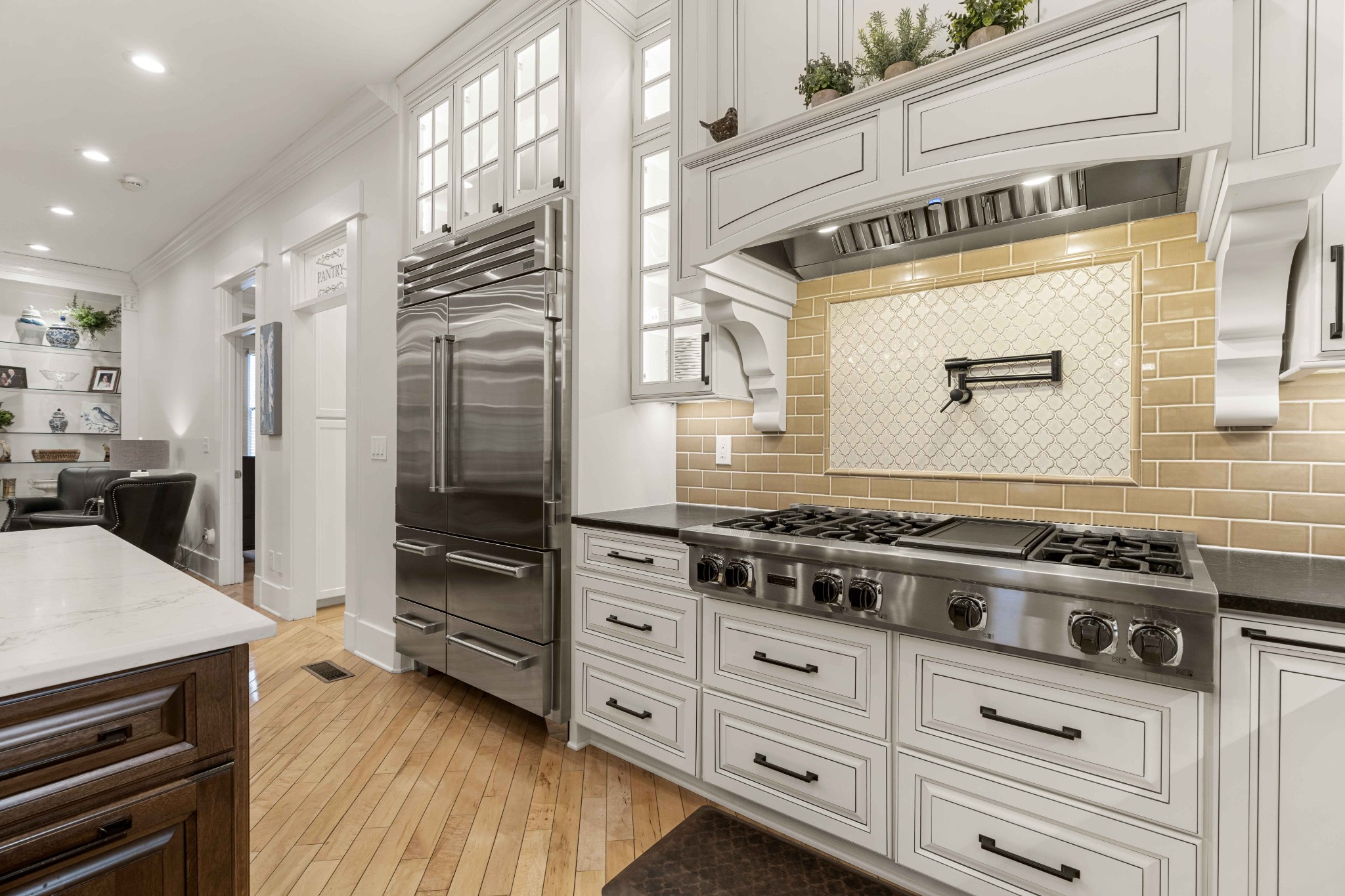 107 Tiffany Court Franklin, TN 37064 - Photo 23 of 98 a kitchen with stainless steel appliances a stove and a refrigerator