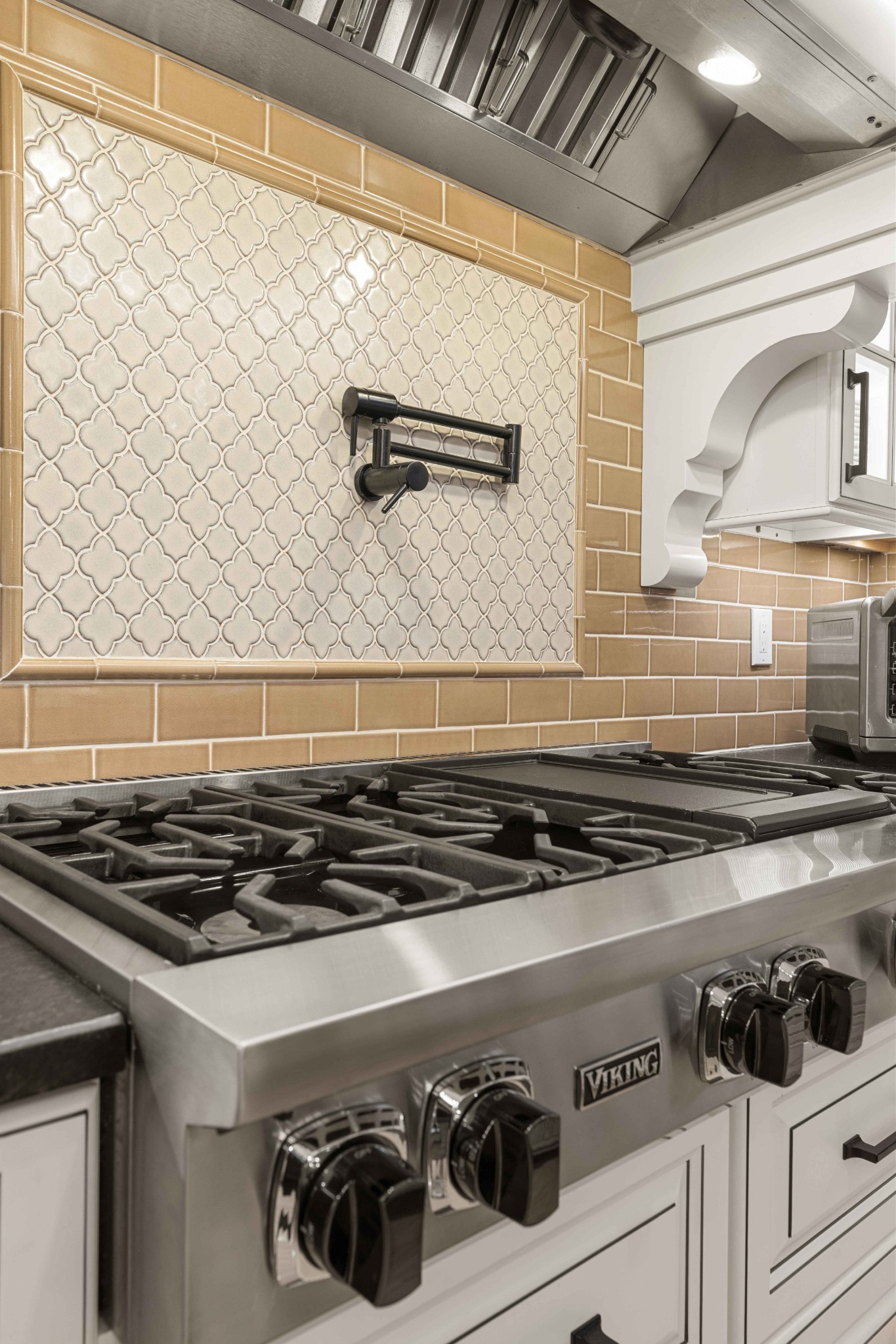 107 Tiffany Court Franklin, TN 37064 - Photo 28 of 98 a close view of a stove a microwave and cabinets in the kitchen
