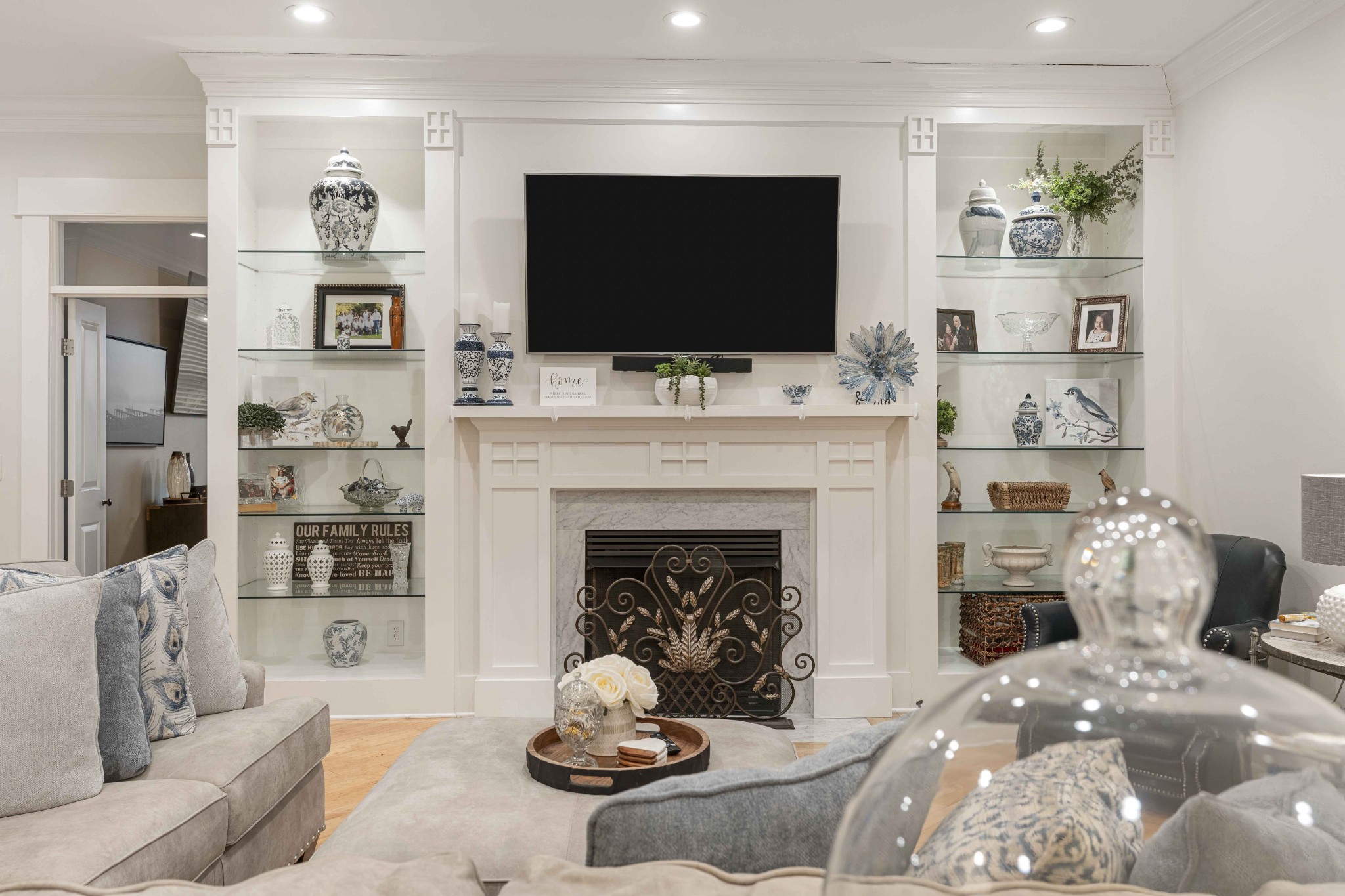 107 Tiffany Court Franklin, TN 37064 - Photo 37 of 98 a living room with furniture a flat screen tv and a fireplace