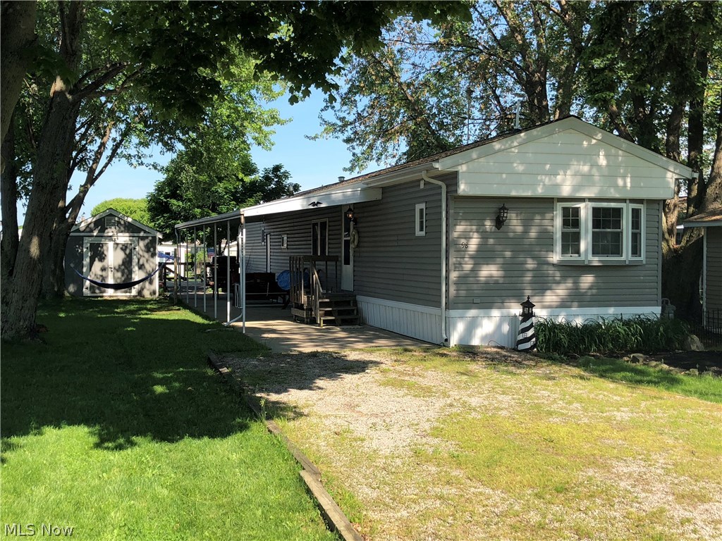 1600 North Buck Road, Unit 98 Lakeside Marblehead, OH 43440 - Photo 1 of 32 Welcome to 98 Locust Street!
