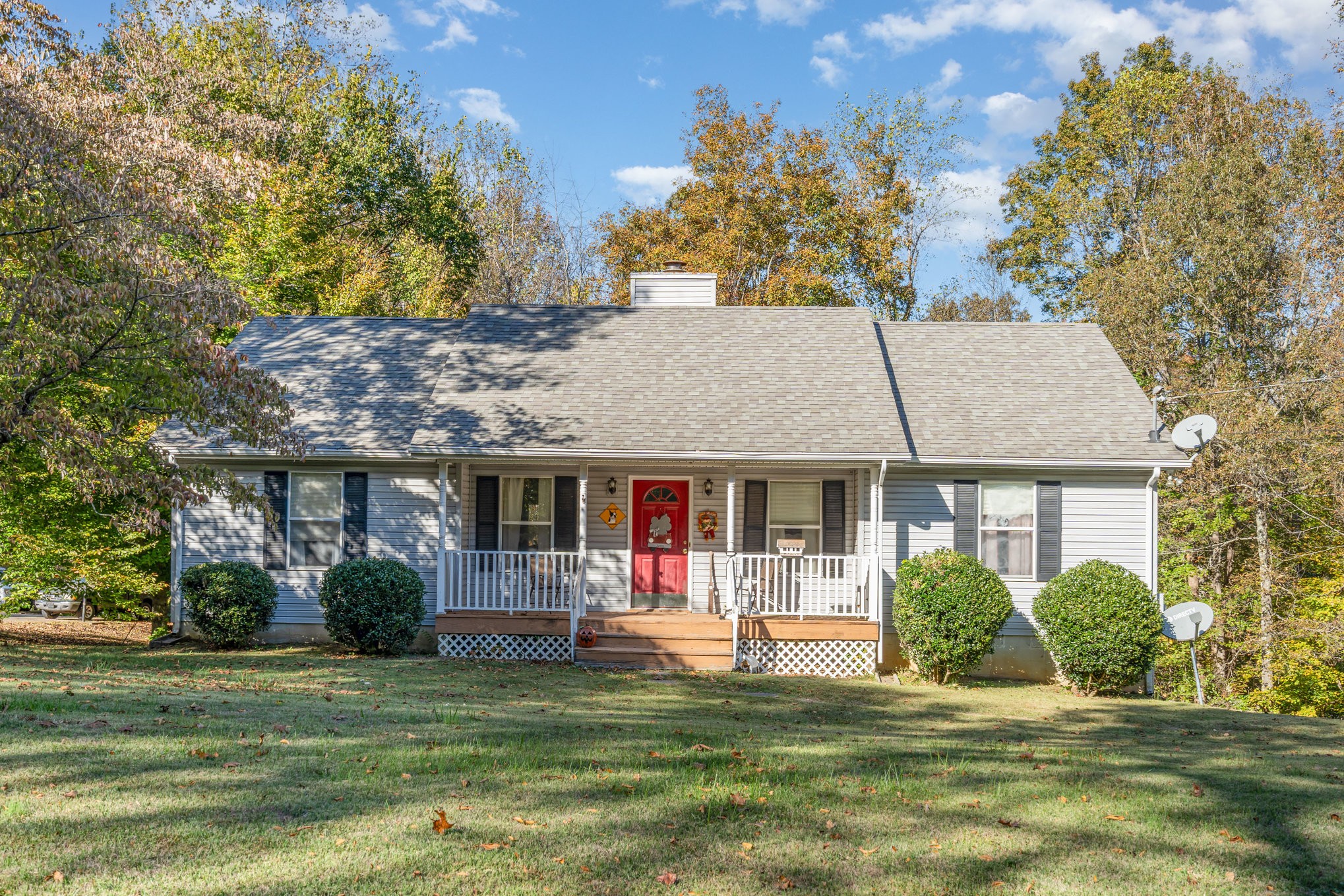 front view of a house with a big yard