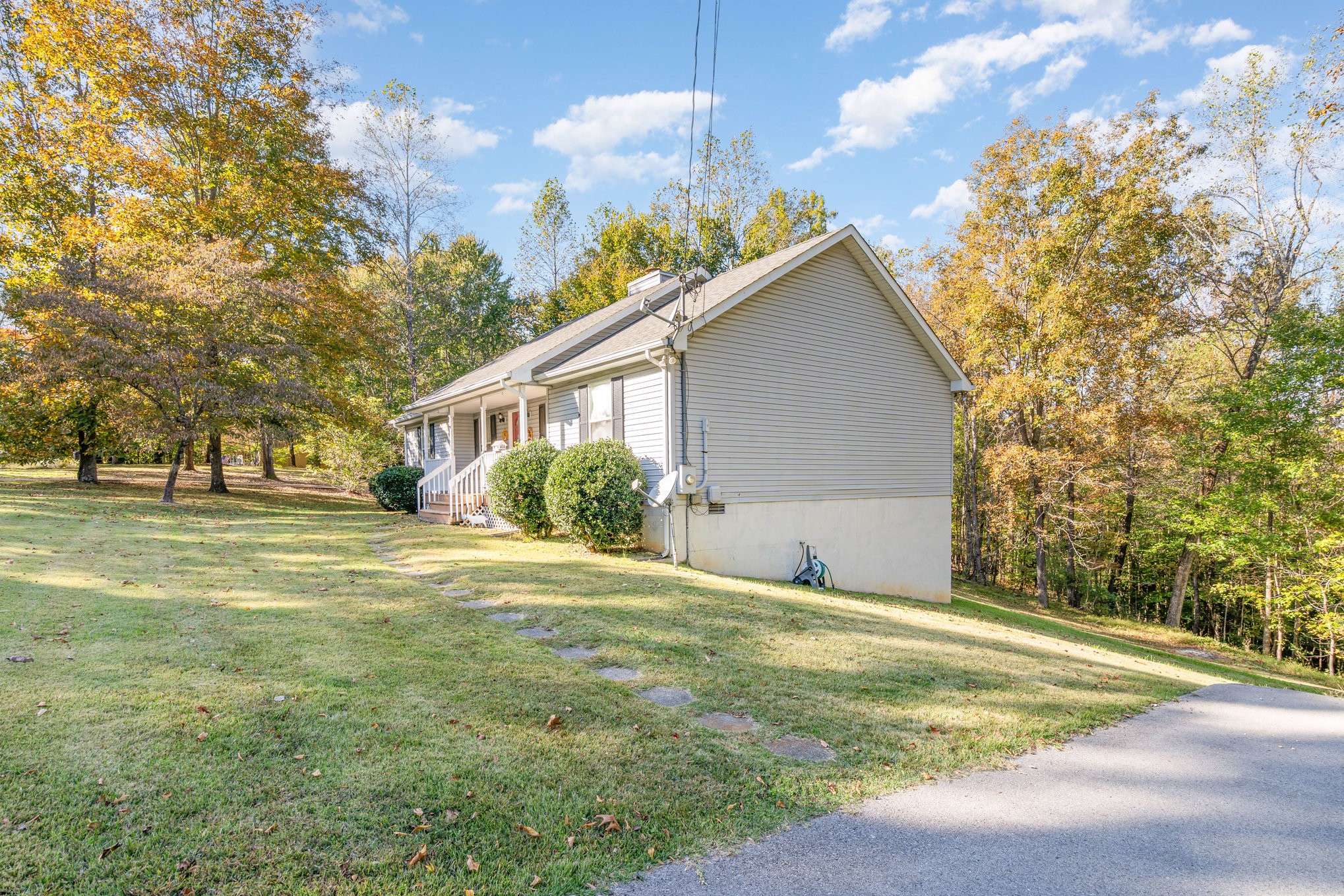 1180 Simms Heights Road Kingston Springs, TN 37082 - Photo 25 of 31 a view of a house with a yard and garage