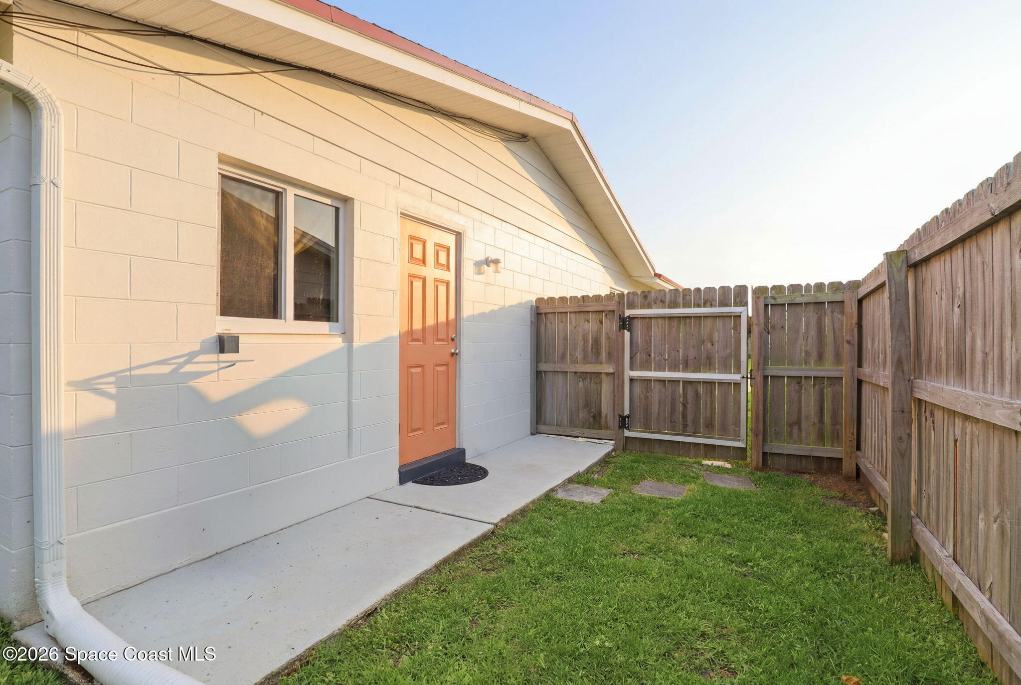 908 Jefferson Road Rockledge, FL 32955 - Photo 23 of 37 a view of backyard with tub and trees